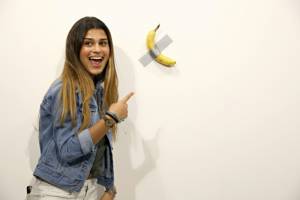 Man eats $120,000 piece of art -- a banana taped to wall.jpg