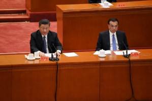 Xi invokes Chinese military might with US in mind.jpg