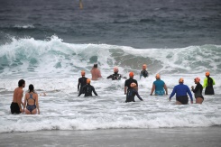 Rain-sodden Sydney ends lockdown after 106 days