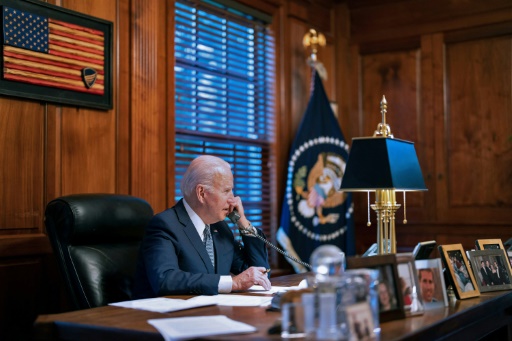 Biden and Putin trade warnings over Ukraine, but vow diplomacy