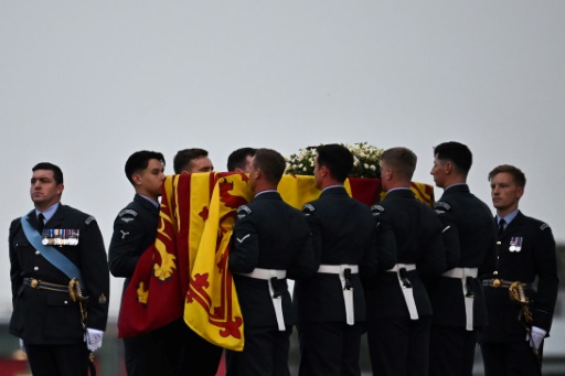 Under leaden skies, Queen Elizabeth II's coffin returns to London