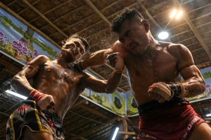 Myanmar traditional boxing packs a punch, kick and headbutt.jpg
