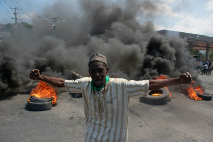 Gunfire booms in Haiti as politicians seek to form interim gov't.jpg