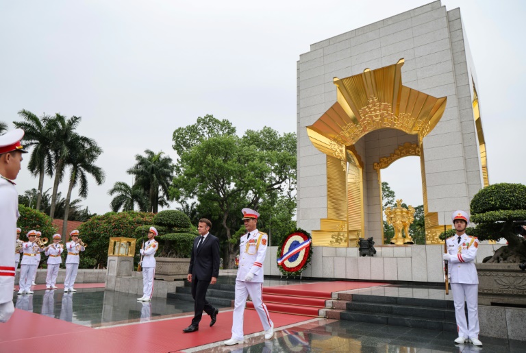 France's Macron in Vietnam to offer third way between US, China
