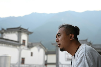Some young Chinese are pushing back on city life and the office grind - GREG BAKER (AFP)