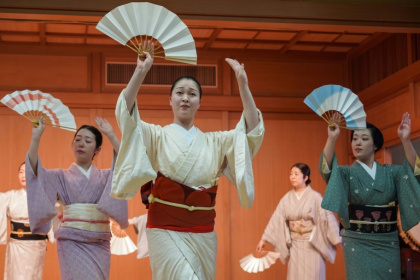 Geishas' talents can include singing, dance and playing musical instruments such as the guitar-like shamisen - Caroline GARDIN (AFP)