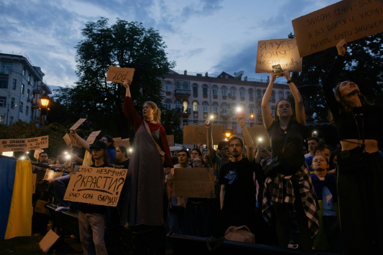 Ukraine curbs anti-corruption agencies, sparking rare protests