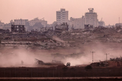 An Israeli military vehicle returning from the Gaza Strip into Israel - Jack GUEZ (AFP)