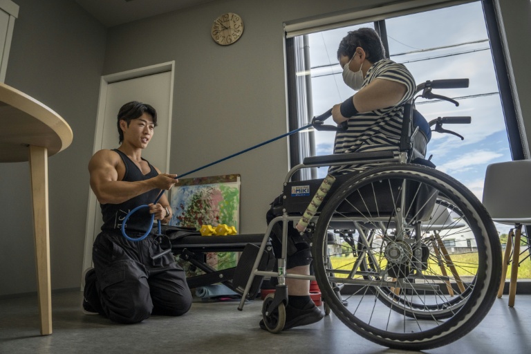 Young bodybuilders lift Japan's ailing care sector
