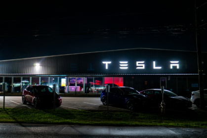 Tesla profits fell due to higher costs despite a boost to revenues from increased auto sales - Brandon Bell (AFP)