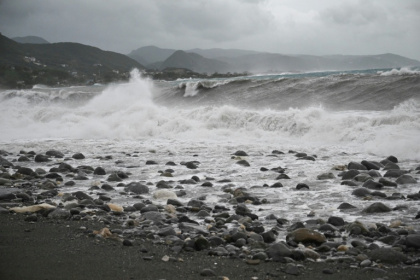 Waves crash onto the beach in Kingston on October 27, 2025; Hurricane Melissa threatened Jamaica with potentially deadly rains after rapidly intensifying into a top-level Category 5 storm - Ricardo Makyn (AFP)