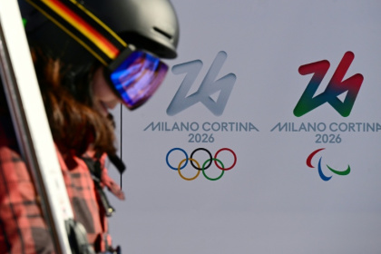 The logos of the 2026 Milan-Cortina Olympics and Paralympics - Tiziana FABI (AFP)