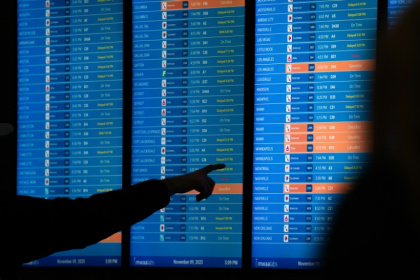 A departures board at the Reagan National Airport in Arlington, Virginia, on day 40 of the government shutdown - Allison ROBBERT (AFP)