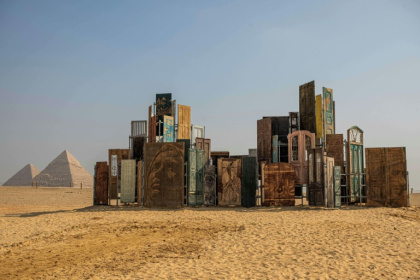 The art installation "Doors of Cairo" by artist Alexandre Farto, aka Vhils, formed part of the fifth edition of the "Forever is Now" art exhibition by Art d'Egypte at the Giza pyramids - Khaled DESOUKI (AFP)