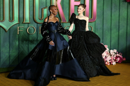 Cynthia Erivo (L) and Ariana Grande (R) are expected to earn Golden Globe nominations for their star turns in 'Wicked: For Good' - HENRY NICHOLLS (AFP)