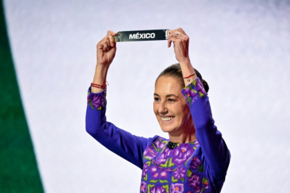 Mexico's President Claudia Sheinbaum wore purple -- a color denoting power and women's resistance -- for her first face-to-face meeting with her US and Canadian counterparts - Mandel NGAN (AFP)