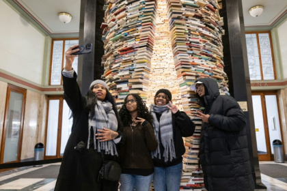 A pile of books installed at Prague's city library has become the Czech capital's latest tourist hit - Michal Cizek (AFP)