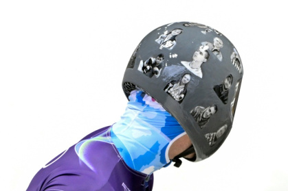 Skeleton racer Vladyslav Heraskevych's helmet features pictures of Ukrainian sportsmen and women killed in the war with Russia. The IOC says he risks disqualification if he wears it in Thursday's qualifying - Tiziana FABI (AFP)