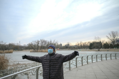 Fifteen years ago, Beijing's Liangma riverbanks would have been smog-choked and deserted in winter, but these days they are dotted with families - Pedro PARDO (AFP)