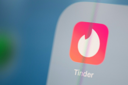 Tinder says AI lets the app 'get a better sense of your personality; your vibe, and what really matters to you' - Martin BUREAU (AFP)