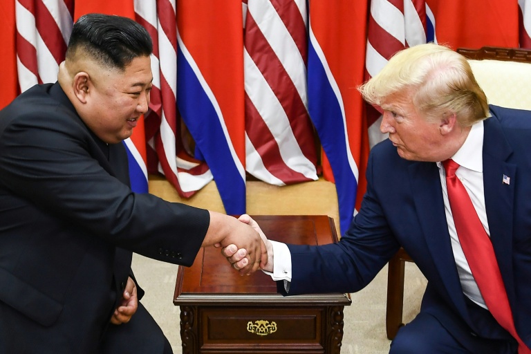 Trump hints at Kim contacts after scaling back Seoul drills